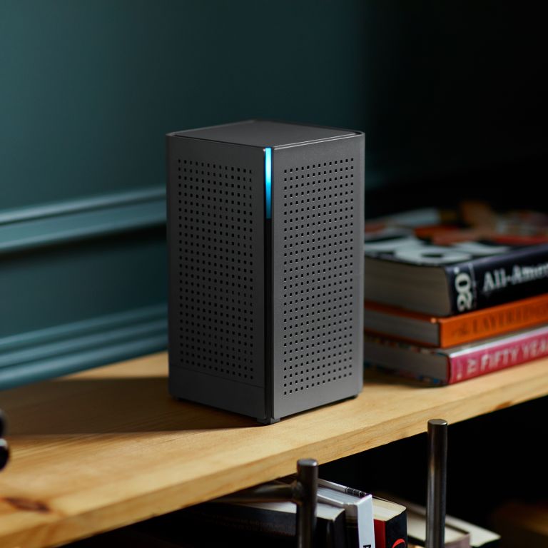 Calix Router on Bookshelf